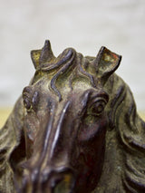 Pair of antique French cast iron horse heads