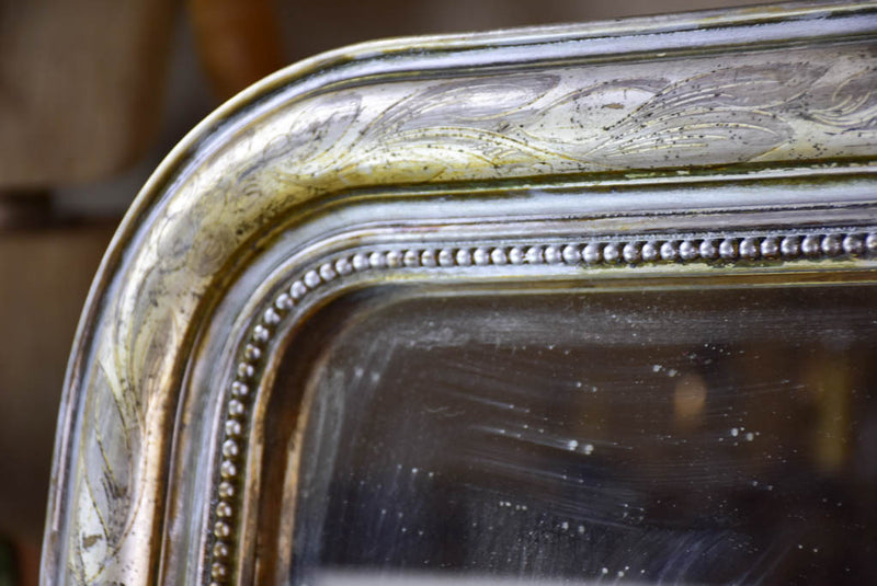 19th century Louis Philippe mirror with silver leaf frame and running pearl 26¾" x 41"