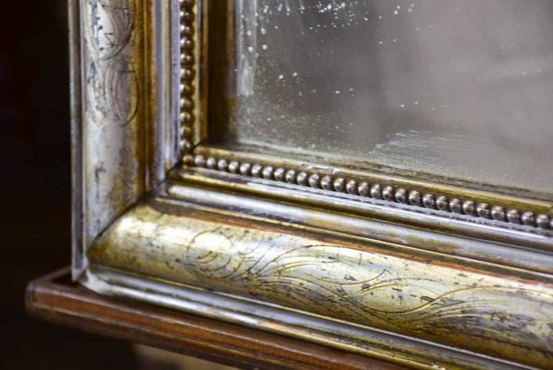 19th century Louis Philippe mirror with silver leaf frame and running pearl 26¾" x 41"