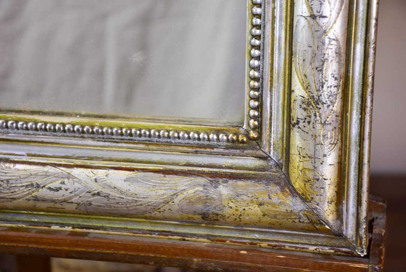 19th century Louis Philippe mirror with silver leaf frame and running pearl 26¾" x 41"