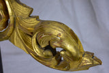 Salvaged gilded boiserie mounted on a stand