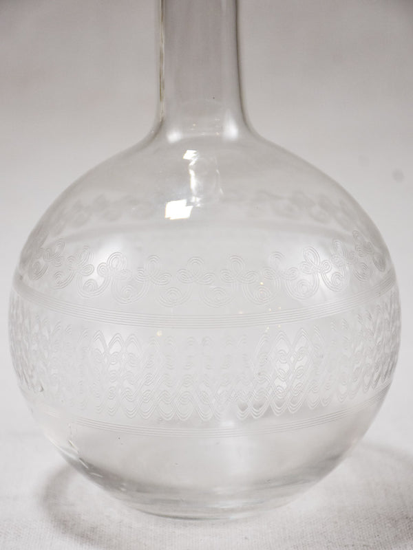 Antique French carafe with stopper and pretty engravings
