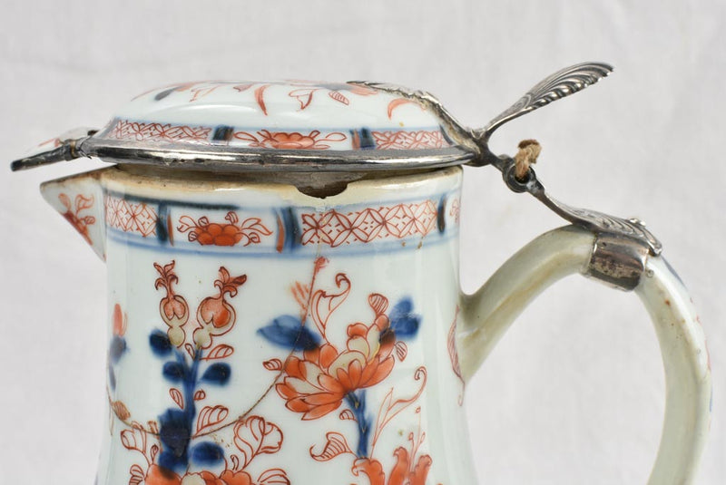Polychrome finish antique porcelain pitcher