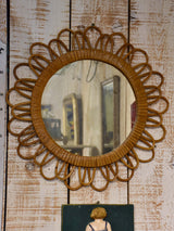 Vintage French sunburst mirror with wicker frame