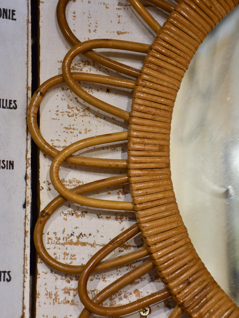 Vintage French sunburst mirror with wicker frame