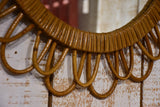 Vintage French sunburst mirror with wicker frame
