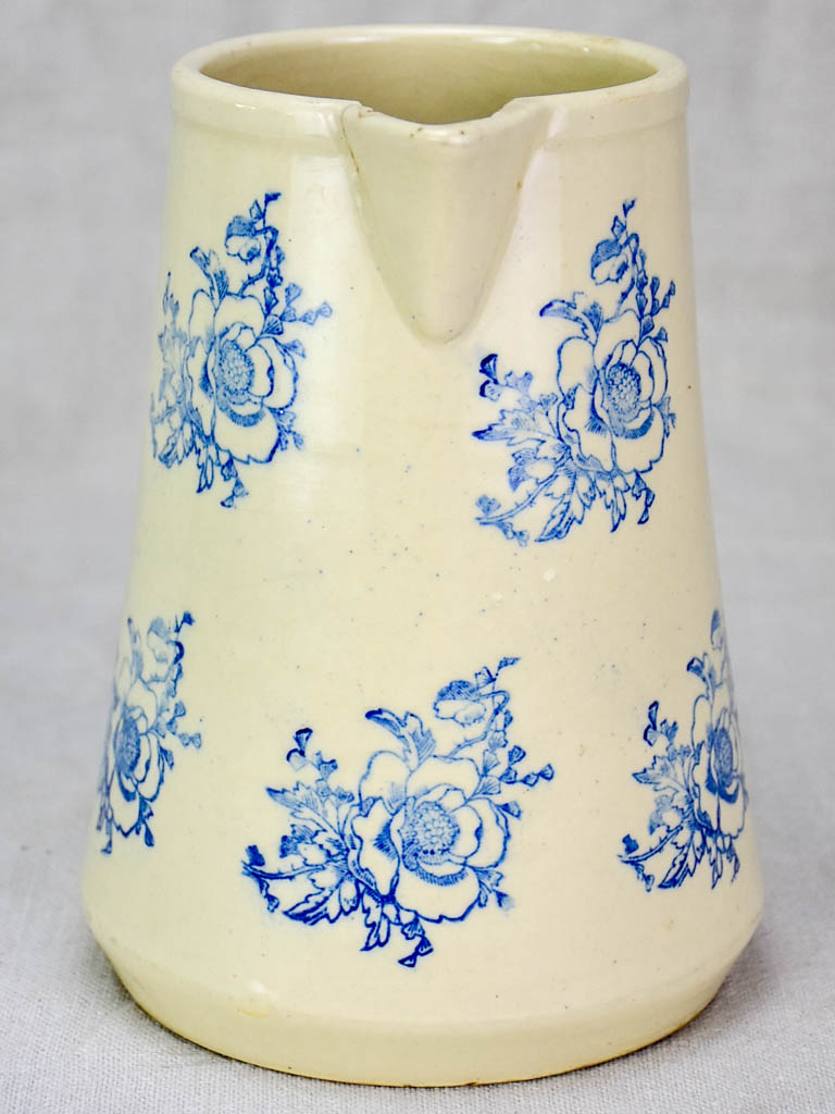 Antique Saint-Uze pitcher with blue flowers