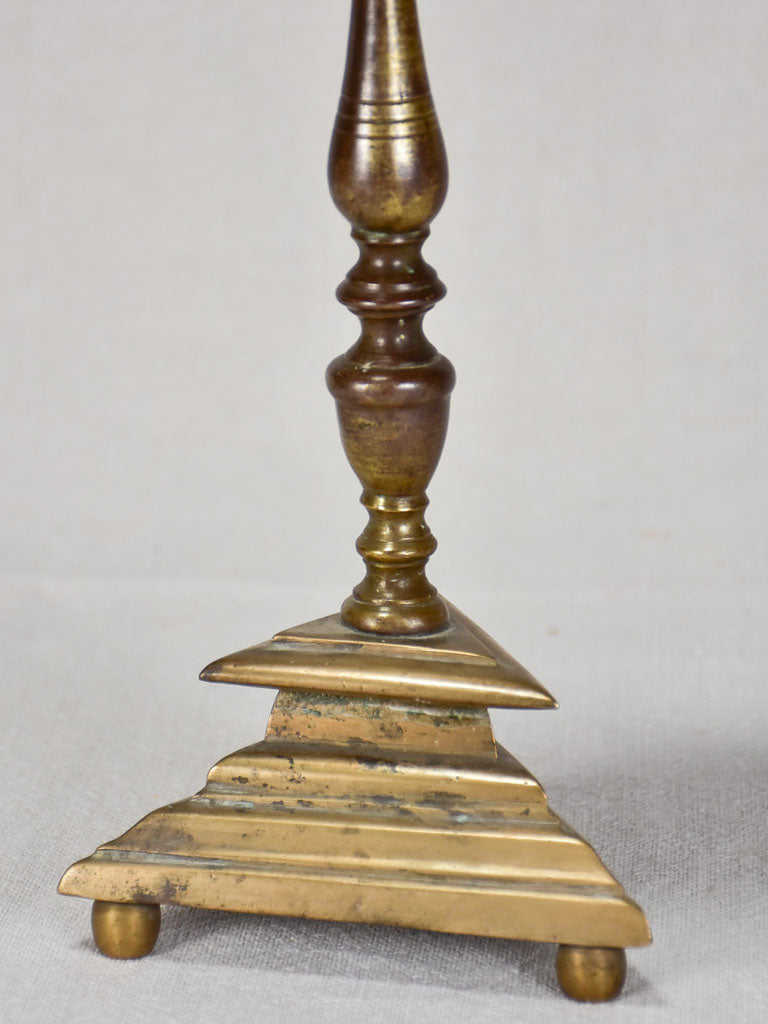 Elegant Bronze Candlestick with Detailed Patina