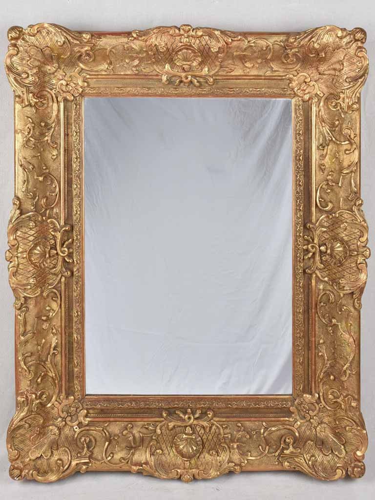 Elaborate Antique Mirror with Gilded Finish