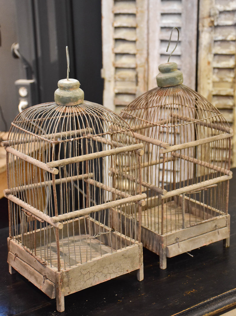 Pair of rustic antique French birdcages