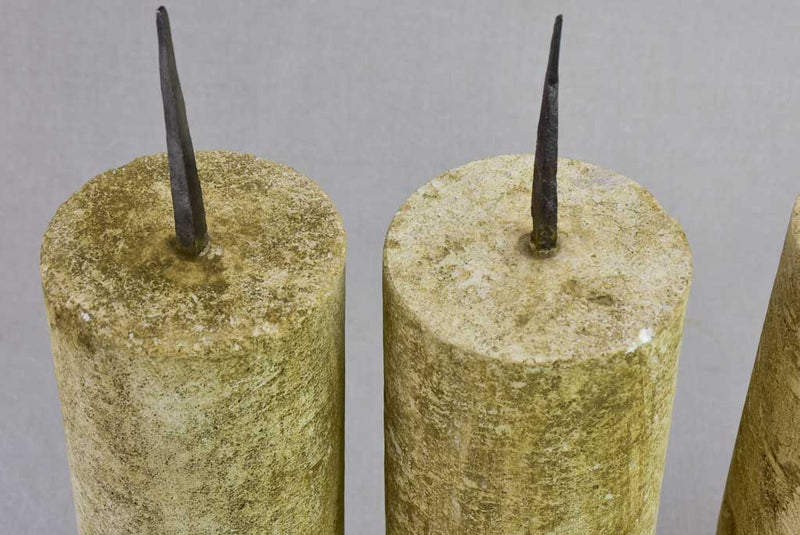 Four large stone candlesticks 16½"