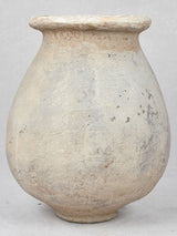 Thick cement 1940s olive jar
