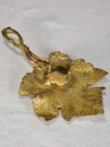 Late 19th-century bronze candleholder in the shape of a vine leaf