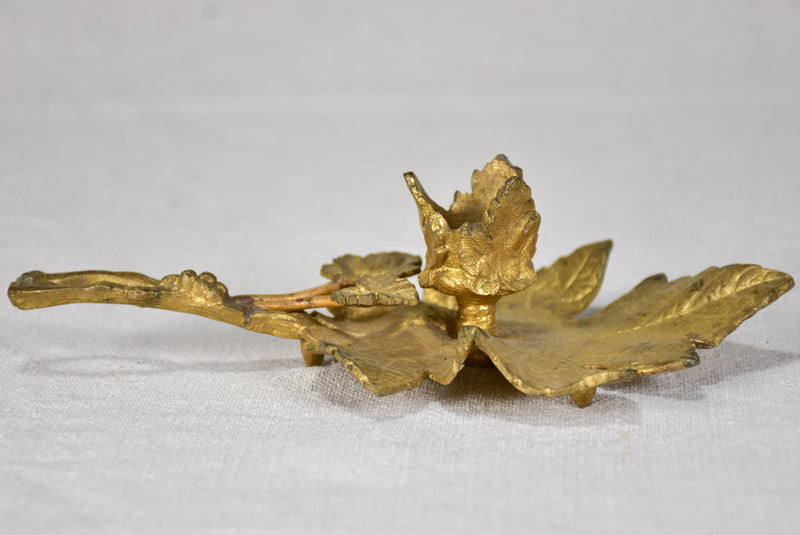 Late 19th-century bronze candleholder in the shape of a vine leaf