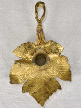 Late 19th-century bronze candleholder in the shape of a vine leaf
