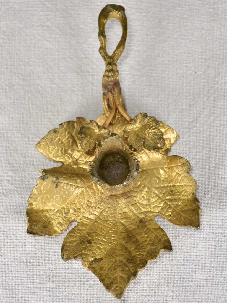 Late 19th-century bronze candleholder in the shape of a vine leaf