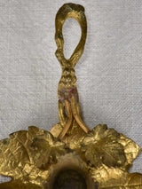 Late 19th-century bronze candleholder in the shape of a vine leaf