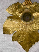 Late 19th-century bronze candleholder in the shape of a vine leaf