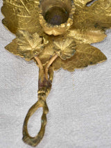 Late 19th-century bronze candleholder in the shape of a vine leaf