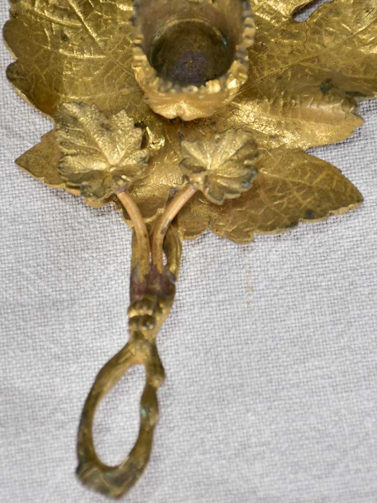 Late 19th-century bronze candleholder in the shape of a vine leaf
