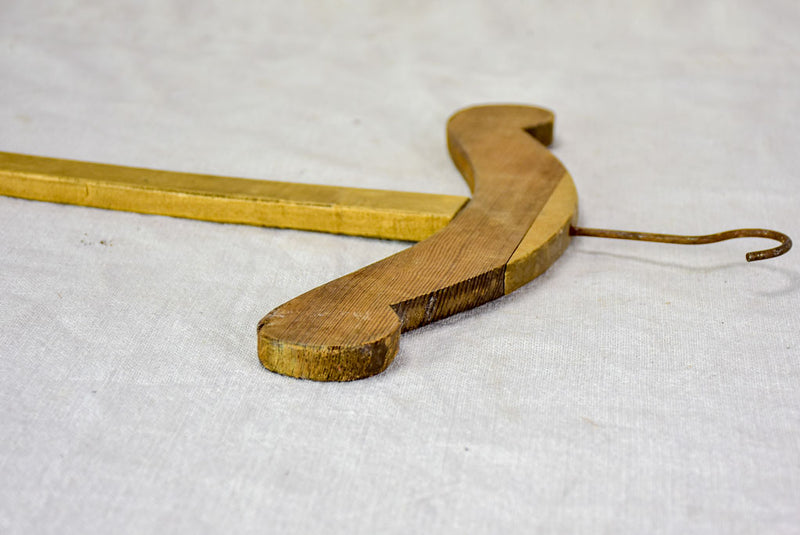 Two antique French coat hangers