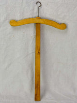 Three antique French coat hangers