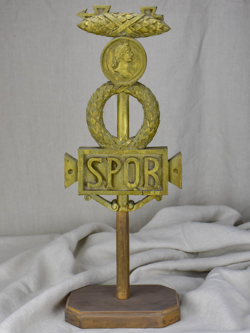SPQR Roman emblem mounted on wooden base