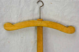 Three antique French coat hangers