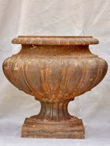 Three early 20th Century cast iron French garden planters