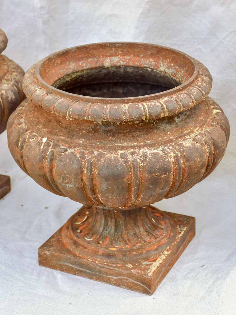 Three early 20th Century cast iron French garden planters