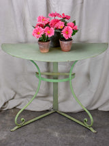 Pair of antique French half-moon garden tables