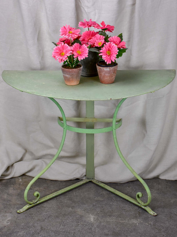 Pair of antique French half-moon garden tables