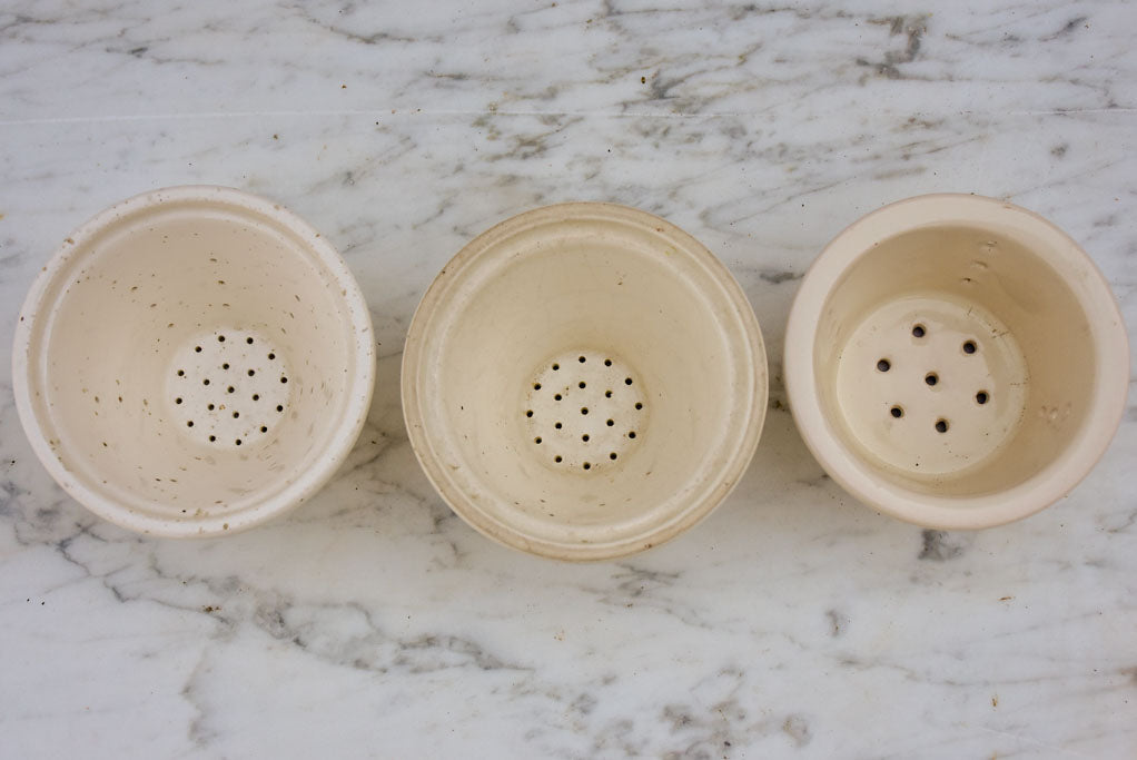 Three white miniature French faience cheese molds