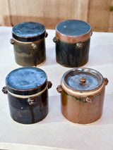 Collection of four double-lid stoneware tea canisters