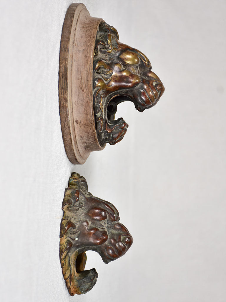 Antique bronze 19th-century lions' head door knockers