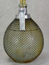 Mid century wine demijohn in mesh from Savoy 9""
