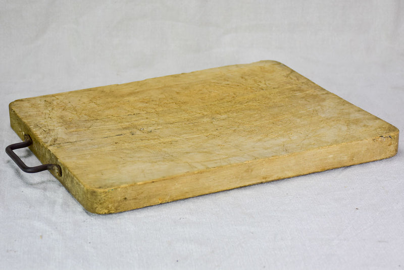 Antique French cutting board with iron handle 14¼" x 17¾"