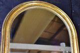 Vintage French arched mirror with gilded frame