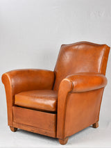Vintage French leather club chair with chapeau gendarme back
