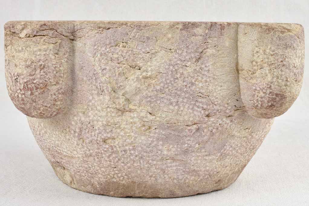 Antique stone mortar with brown / purple patina