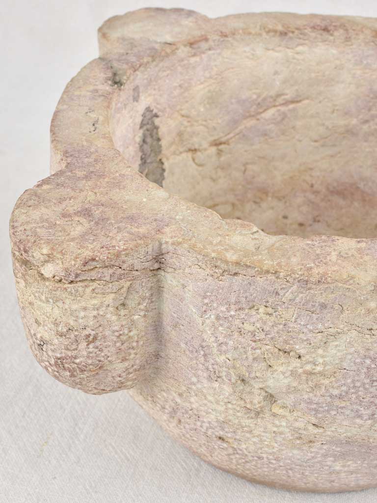 Antique stone mortar with brown / purple patina