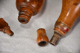 Collection of 4 early twentieth century wooden gun powder flasks
