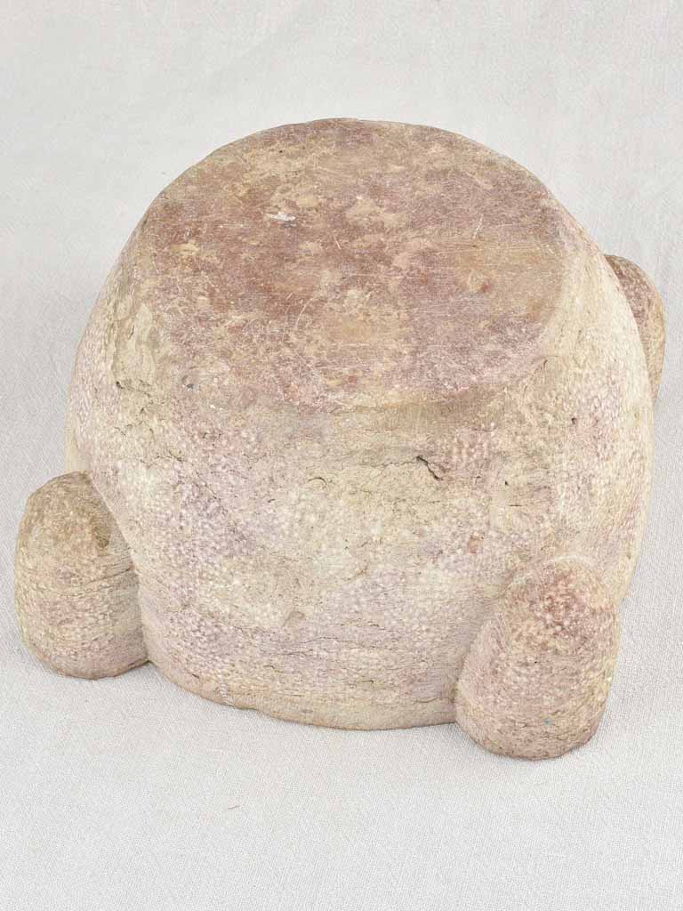 Antique stone mortar with brown / purple patina