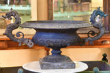 A large dragon-head Medici urn in cast iron