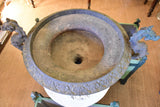A large dragon-head Medici urn in cast iron