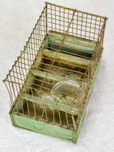 Early 20th century French birdcage with green patina