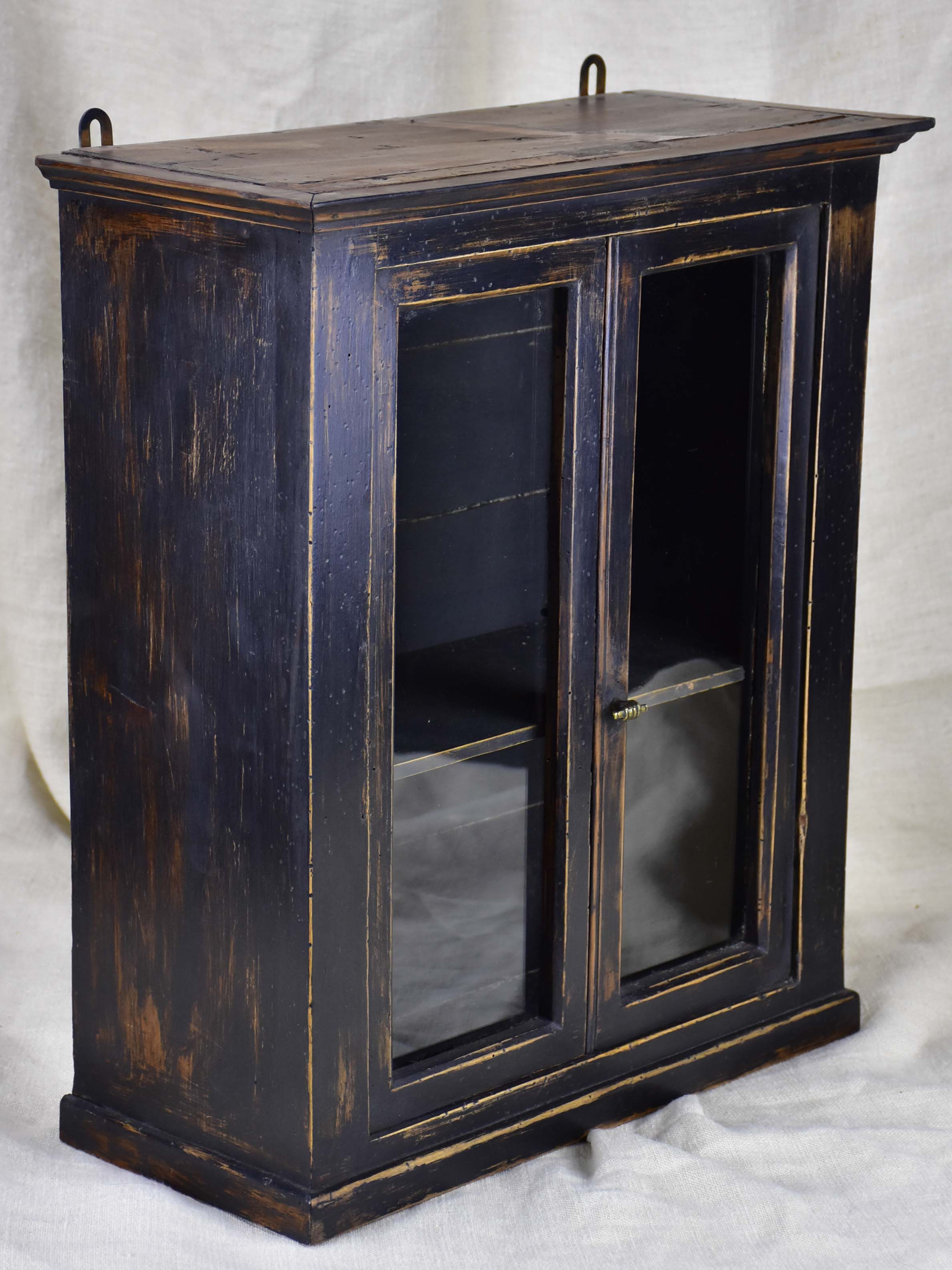 Small late 19th Century French glass door cabinet