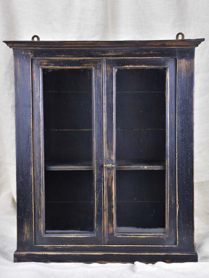 Small late 19th Century French glass door cabinet