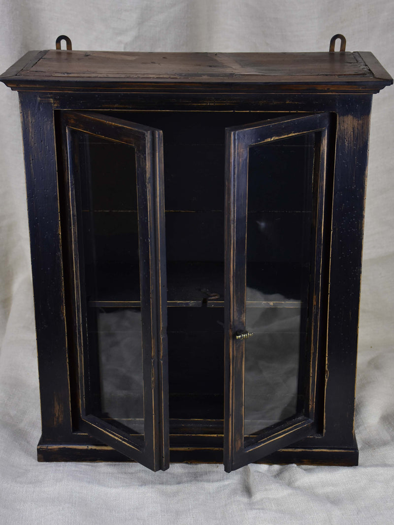 Small late 19th Century French glass door cabinet