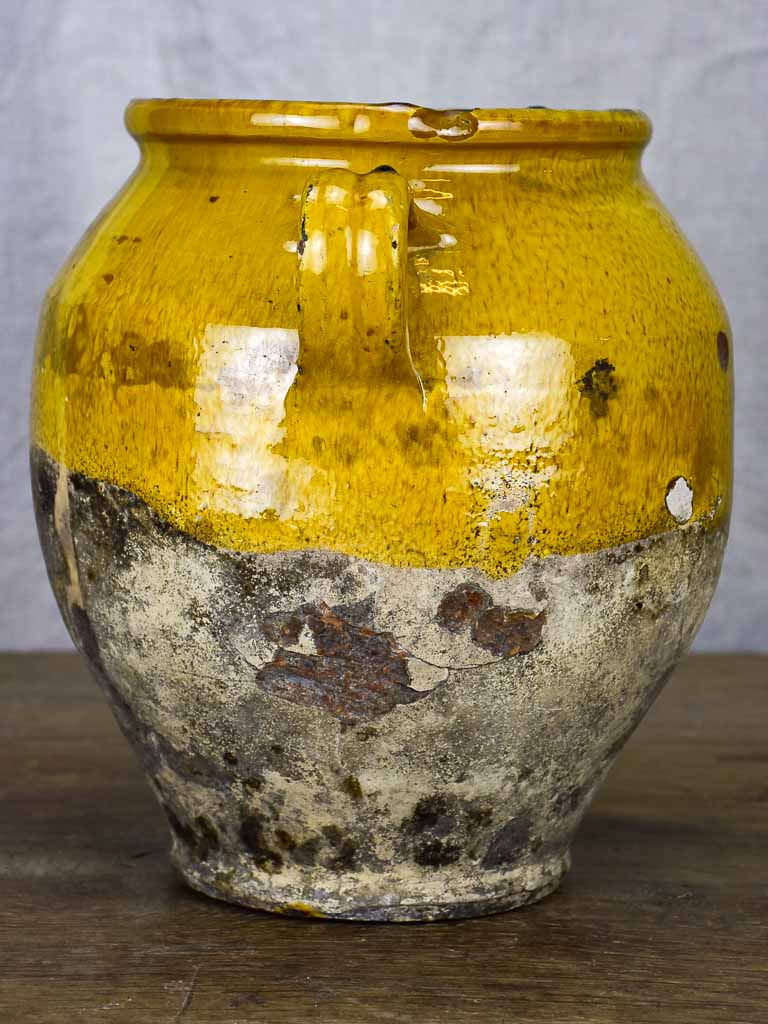 Timeworn antique French confit pot with yellow glaze 10¾"